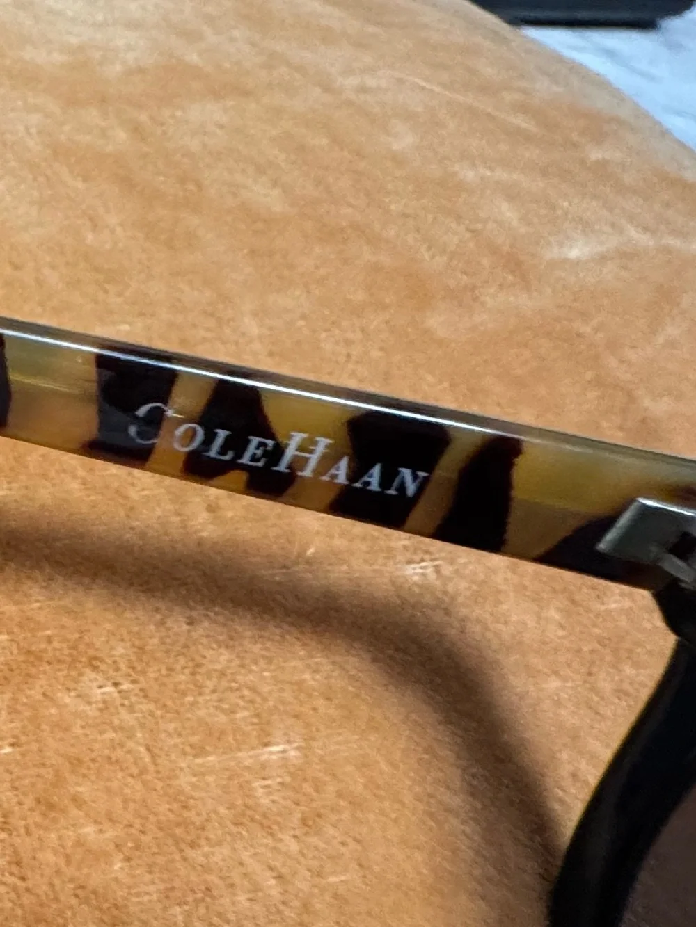 Cole Haan C16069 Black Frame Sunglasses with Tortoiseshell Temples